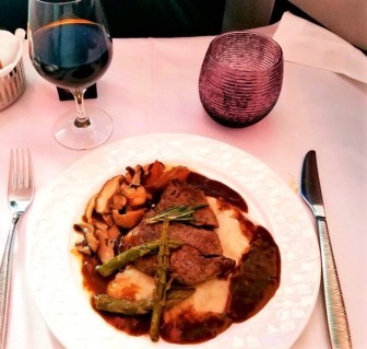Peppercorn beef, mashed potatoes, chanterelle mushrooms, asparagus, and torpedo shallots and Chateau Vieux Maillet Bordeaux.